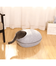 Pawise - Cat Cave Bed, Enclosed Felt Shell with Removable Cushion - 48 x 39 x 26 cm, cozy pet hideaway with a cat entering.