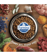 Bowl of Farmina premium cat food surrounded by fresh ingredients, promoting a happy pet and healthy nutrition.