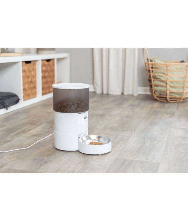 Trixie - TX-S Smart 3.0L Automatic Food Dispenser with pet food bowl on wooden floor.