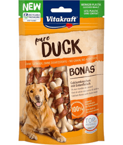 Vitakraft Pure Duck Bonas dog calcium bones, high protein training treat for all life stages, 80g package with dog.