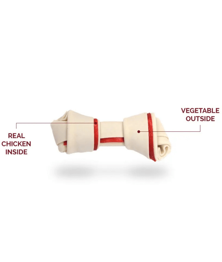 SmartBones rawhide-free dog chews showing real chicken inside and vegetable outside in a bone shape.