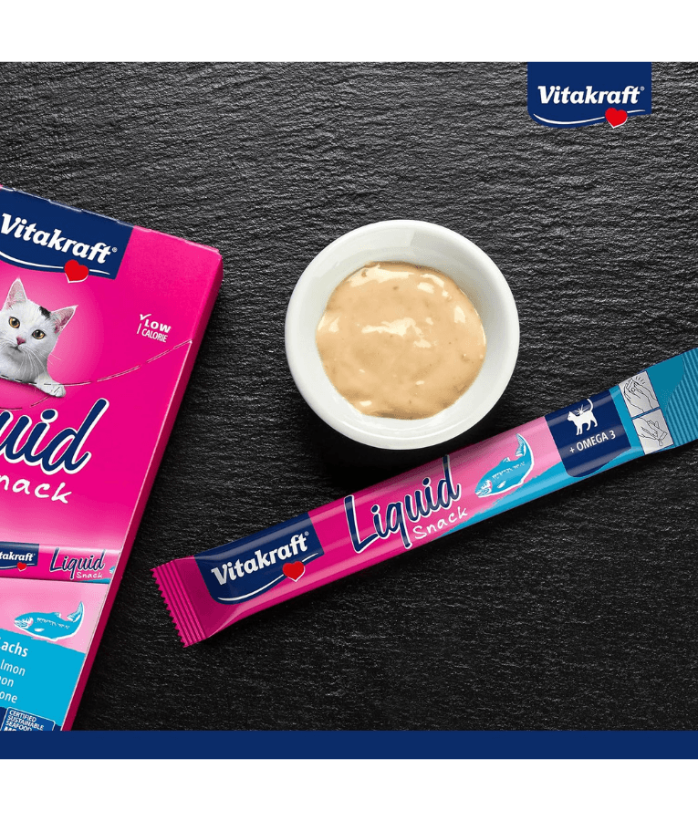 Vitakraft Liquid Snack Salmon in a bowl with sachet packaging, omega 3 for cat treat, low-calorie creamy texture.