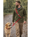 Duvo+ – EXPLOR West Duo Leash, Red, Woven Nylon, Adjustable & Hands-Free – XXL in use by dog owner walking a golden retriever.